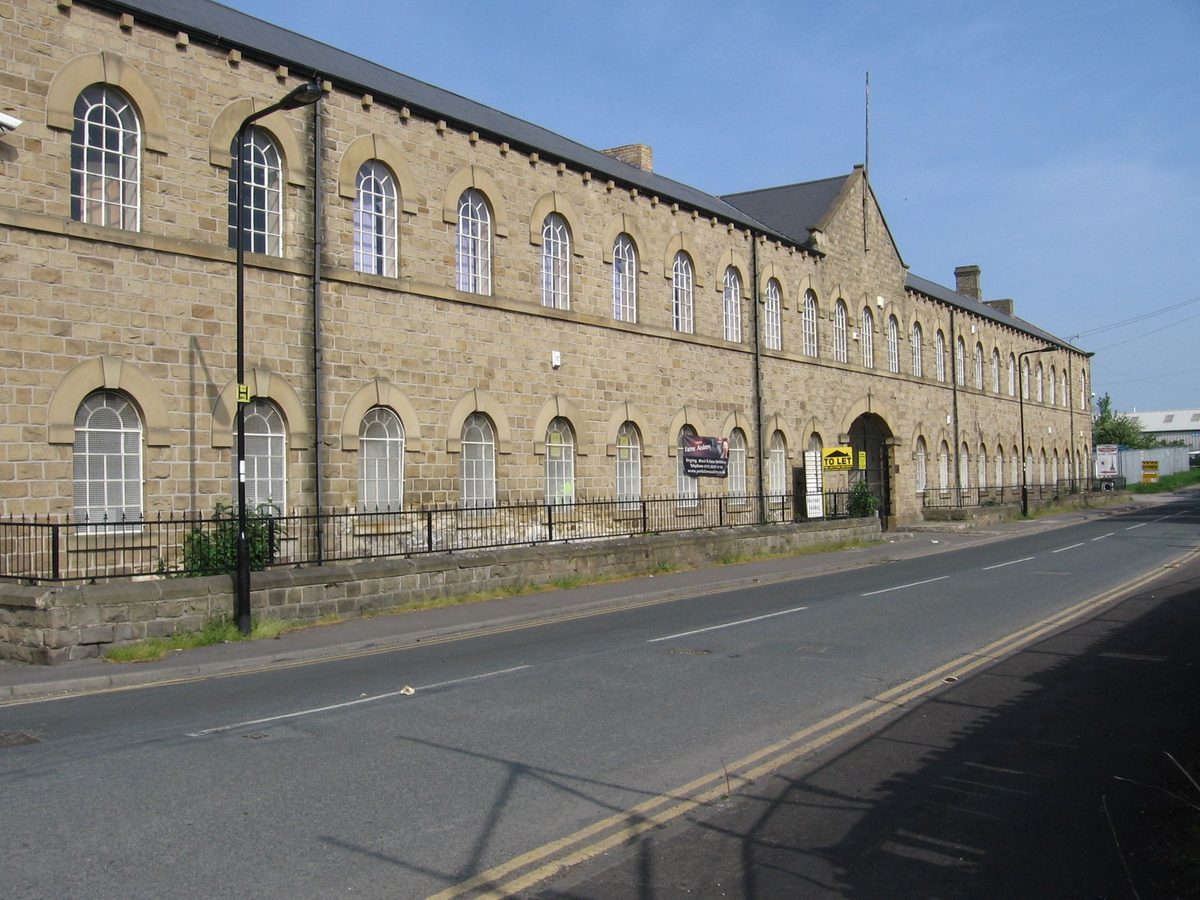 Hattersley Buildings, Swinton. Photo by Dave Bevis, CC BY-SA 2.0, via Wikimedia Commons. Hattersley Buildings, Swinton