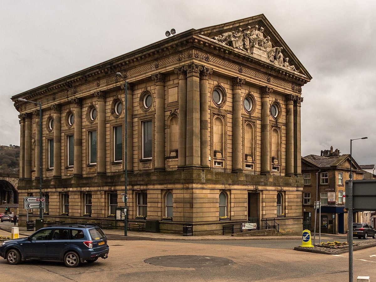 Todmorden Town Hall. Photo by Peter McDermott, CC BY-SA 2.0, via Wikimedia Commons. Todmorden Town Hall