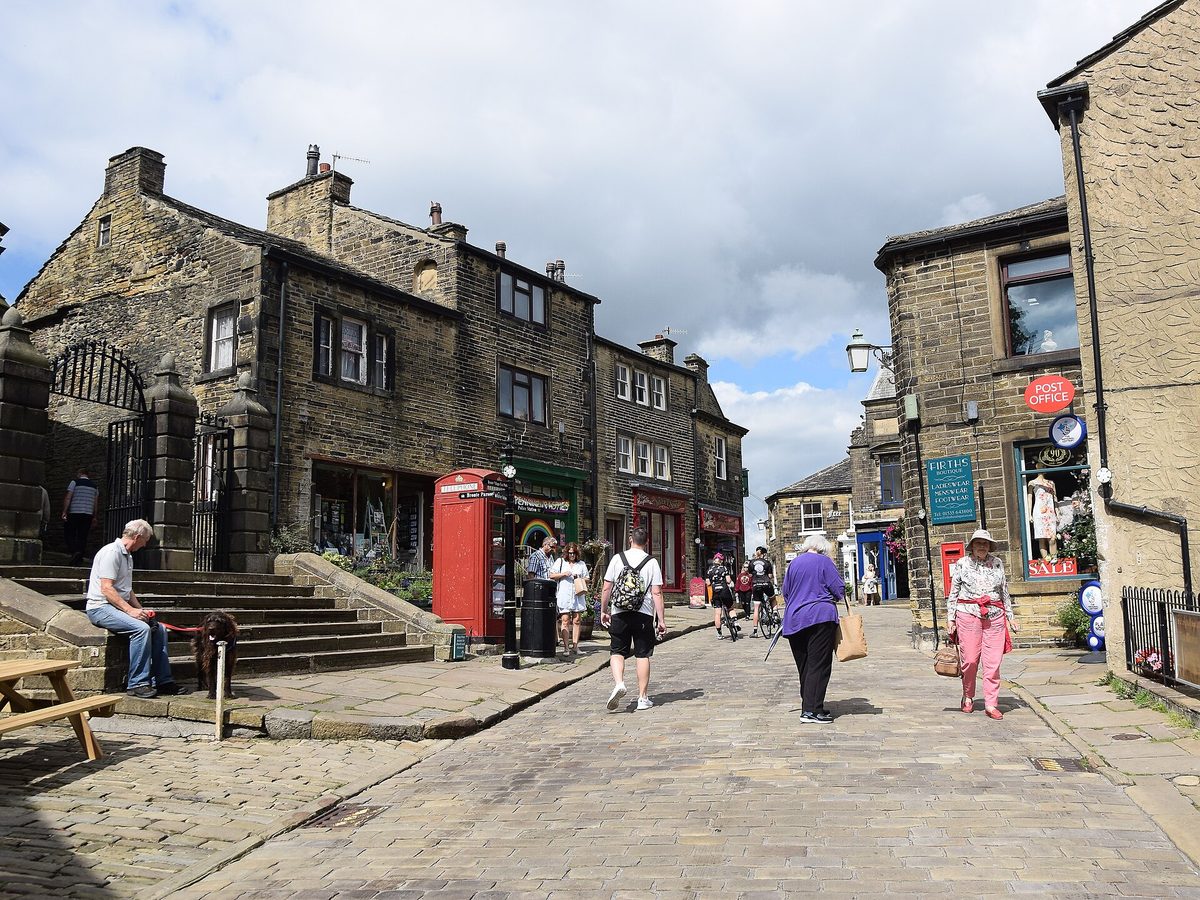 Main Street, Haworth. Photo by Bill Harrison, CC BY-SA 2.0, via Wikimedia Commons. Main Street, Haworth